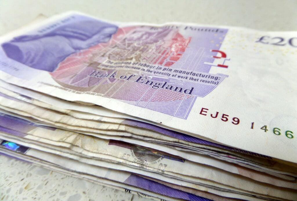 A stack of twenty pound notes