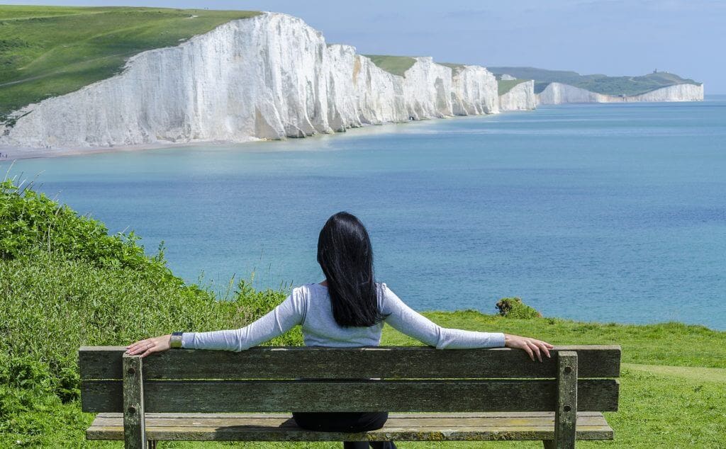 A woman enjoying a picturesque sea view