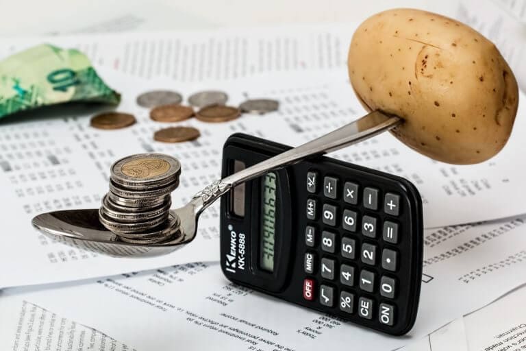 Balancing coins and a potato on a calculator