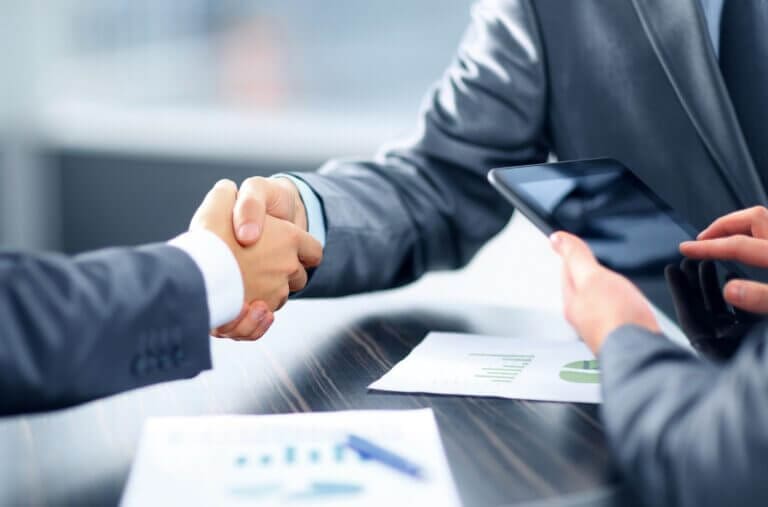Shaking hands over a finance agreement