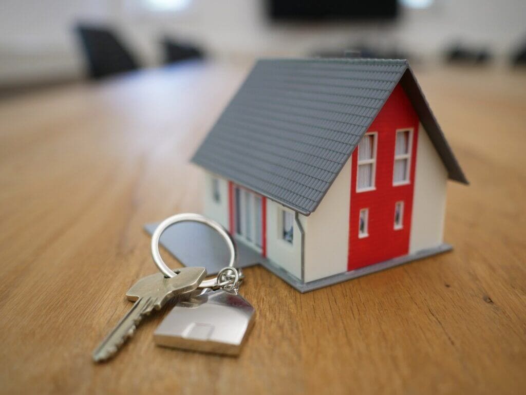 A toy house and a door key