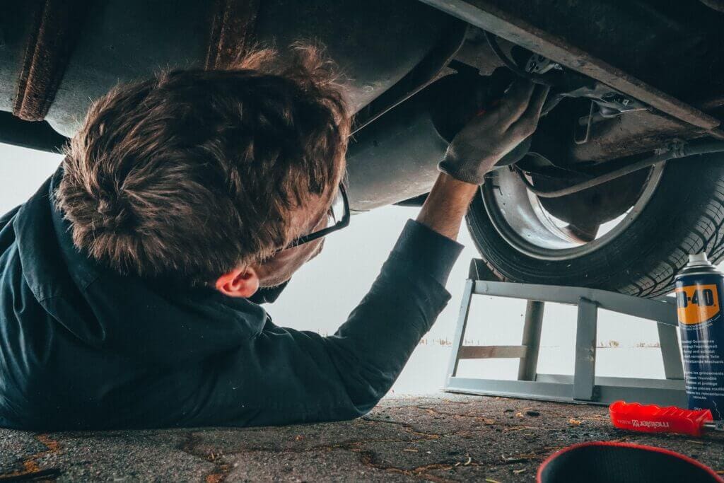 A man repairing a car