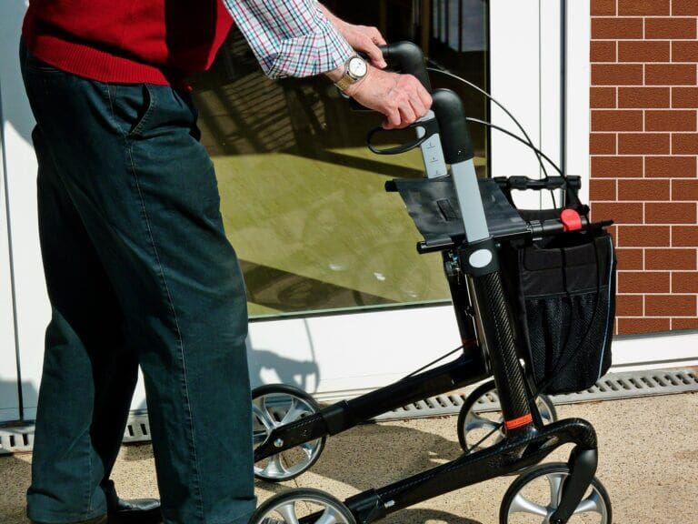 An elderly person using a mobility device