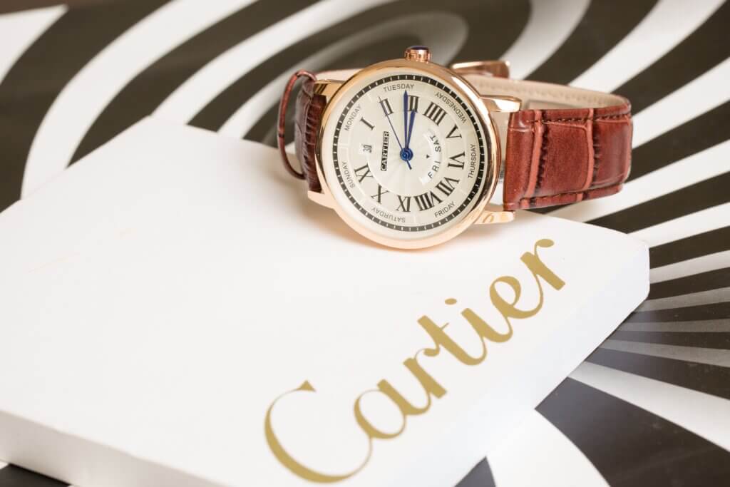 expensive watch cartier with brown leather strap