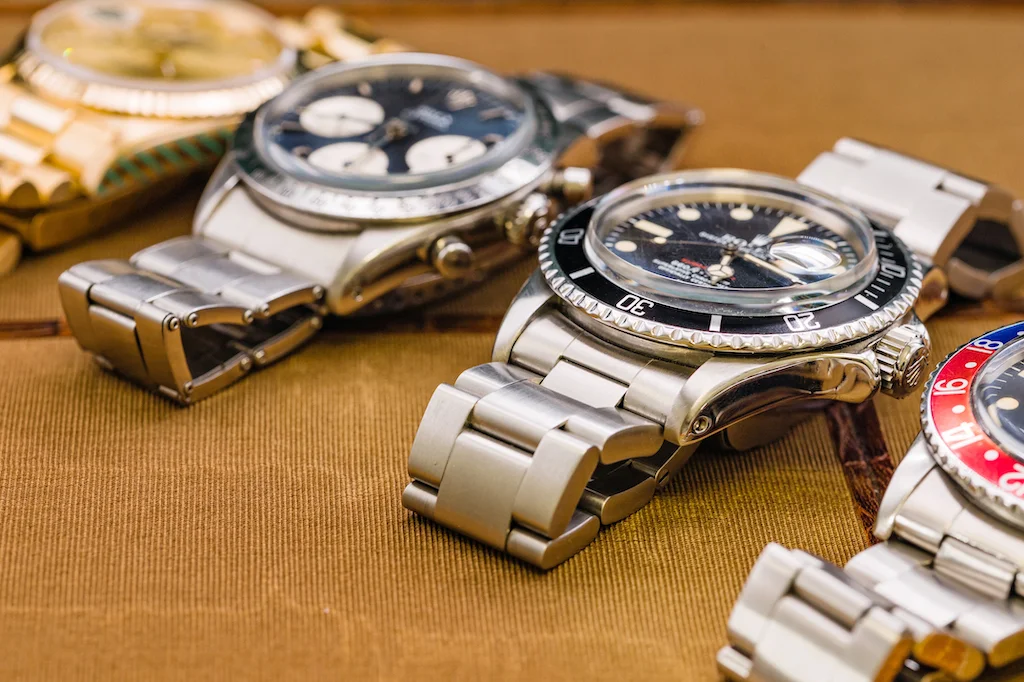 Four preowned luxury watches